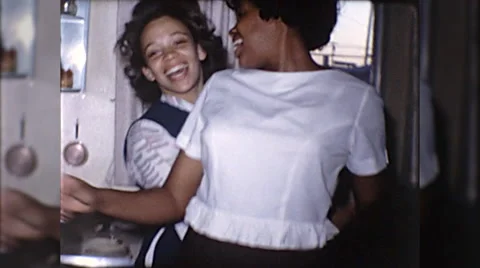1960s Young Women in Kitchen African American Black Vintage Old Film Home Movie Stock Footage