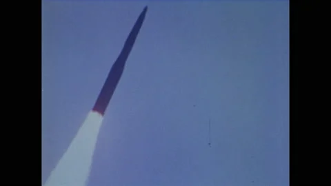1960s:Missile explodes from underground silo. Workers help lower Polaris missile 動画素材 139284289