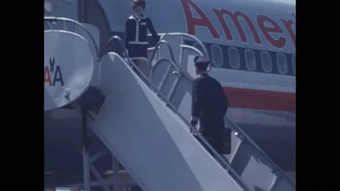 1960s:Pilot boards American Airlines Astrojet plane, Pilot walks up plane steps, Stock Footage 194465917