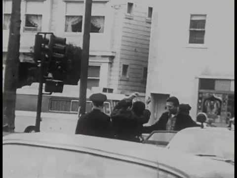 1961 _ A narrator discusses the police attempting to intimidate student Stock Footage