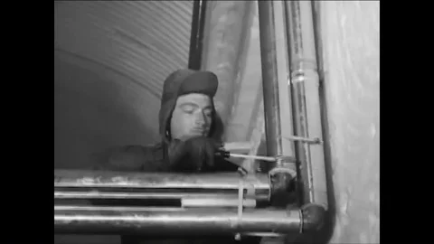1961 - Construction workers create a well and install an electrical heating 動画素材 86036996