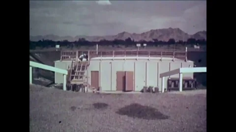 1961 - An engineer makes connections at test control boxes, shots of generator Stock Footage 85229325