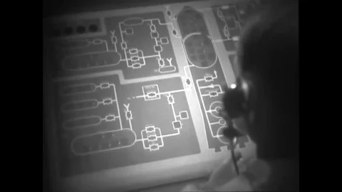 1961 - A flight controller presses buttons on an instrument panel at an Atlas-D Stock Footage