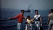 1961: Immigrant Family On A Boat To Ellis Island.  New York City Stock Footage