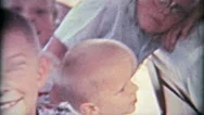 1961: Packing 4 Kids Into The Back Of A Car For A Family Road Trip. Stock Footage