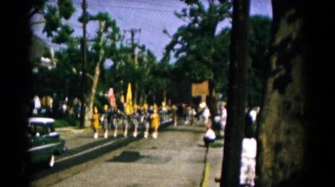 1961: parade marching band coming towards camera from far away HAGERSTOWN Stock Footage