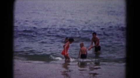 1961: people enjoying the beach on beautiful afternoon. HAGERSTOWN, MARYLAND Stock Footage
