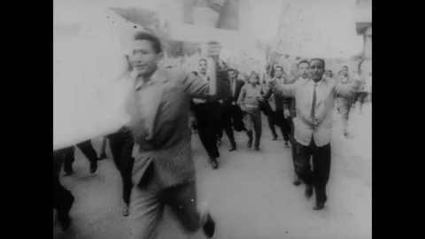1961 - Protestors in Cairo, Egypt riot after Patrice Lumumba's death, and crowds Stock Footage