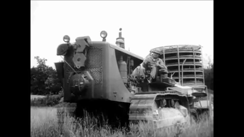 1961 - The US Army Corps of Engineers uses mechanical mine layers and ditch Stock Footage 85956965