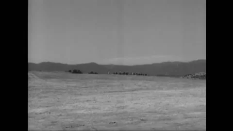1961 - US Cavalrymen fight Native Americans to the music of singing American Stock Footage 155854560