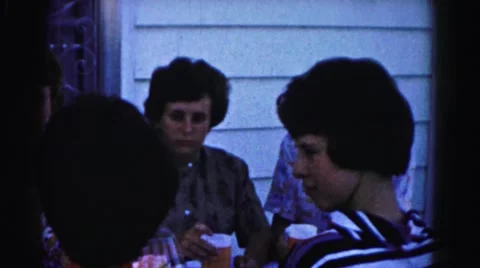 1962: ladies enjoying an outdoor picnic together at the table HAGERSTOWN Stock Footage