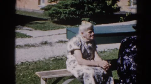 1962: a old couple is seen CHICAGOLAND AREA Stock Footage
