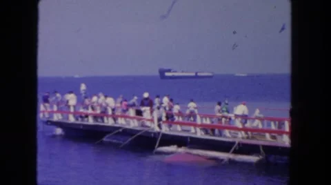 1962: people waiting on sea dock with fishing rod SAN PEDRO, CALIFORNIA Stock Footage