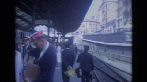 1962: Slow Moving Train at Station in Cannes France Stock Footage 72522696