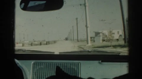 1962: slowing driving through a tiny town. IZMIR TURKEY Video stock 68800143