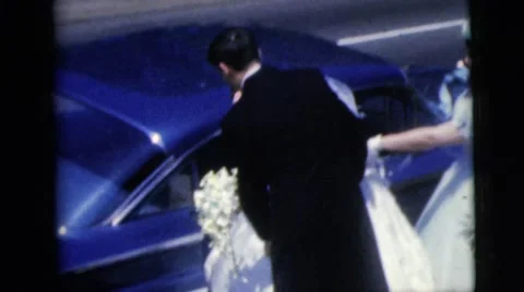 1962: the two married couples are preparing to get into the car NEW YORK CITY Stock Footage