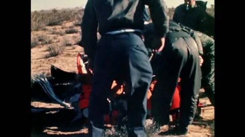 1962 - A USAF airman is pulled out of his escape capsule after ejecting in the Video stock 155854182
