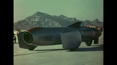 1963 - After several failed test drives, mechanics adjust the tires and front 스톡 동영상 143779126