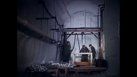 1963 - Construction workers create a well and install an electrical heating 動画素材 84723019