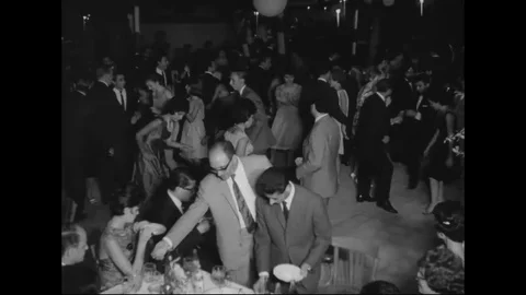 1963 - Couples do the twist and slow dance at a party in Iran. Stock Footage 122530613