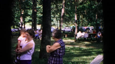 1963: family summer reunion in public picnic park area COLD SPRINGS, NEW YORK Stock Footage