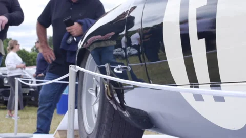 1963 Lightweight Jaguar E-Type With Spectators  Video stock 156582858