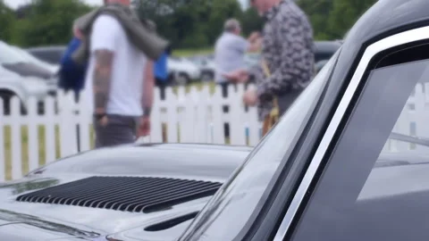 1963 Lightweight Jaguar E-Type People walking Past Video stock 156584159