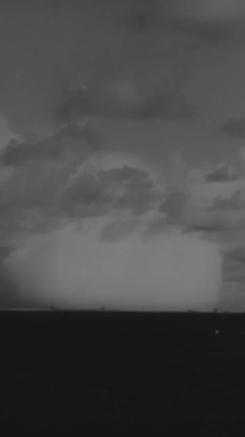 1963 - Mushroom clouds burst after atomic bomb tests. 스톡 동영상 284133180