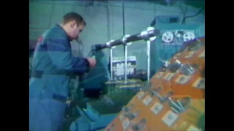 1963 - Numerically controlled machines position panels for wiring and drill Stockbeeldmateriaal 86136946