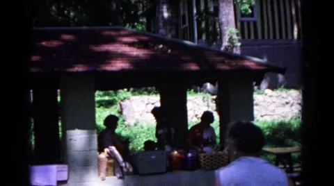 1963: a picnic in a garden area is seen COLD SPRINGS, NEW YORK Stock Footage