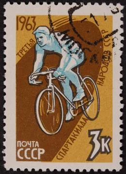 1963 USSR Postage Stamp Featuring Cyclist and Cyrillic Text Stock Photos