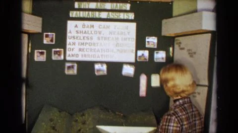 1963:TEXAS USA.Lady Looking At The Evolution Of Man At Work Stock Photos