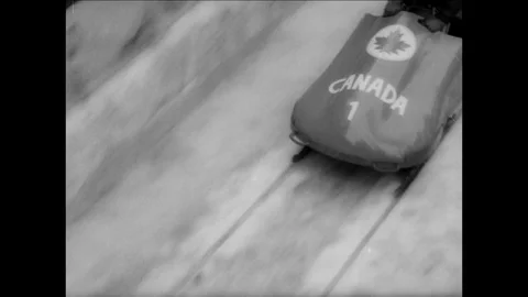 1964-Bobsleigh Driving / Olympic Winter Games / Austria / 1964 Stock Footage 77829823