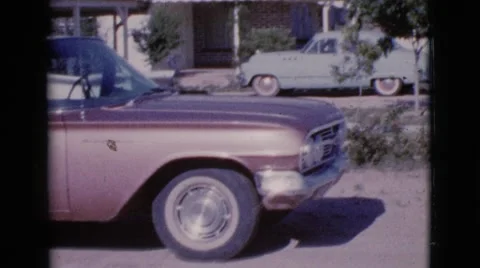 1964: cars are seen passing by a building COTTONWOOD, ARIZONA Stock Footage