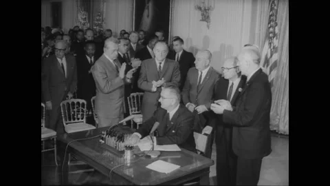 1964 - LBJ Signs The Civil Rights Act In... | Stock Video | Pond5