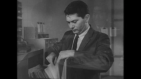 In 1964 a man reveals a Soviet spy plot which he is participating in. Vídeos de archivo 106298645