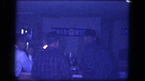 1964: men and women standing around a bar smoking and drinking NIAGRA FALLS Stock Footage