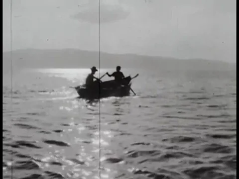 1965, 1972’ Macedonian men fish in the ocean. Stock Footage