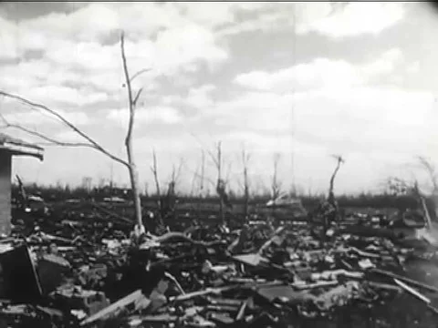 1965 _ Shots of rubble in the Midwest after a tornado, and shots of floods in Stock Footage
