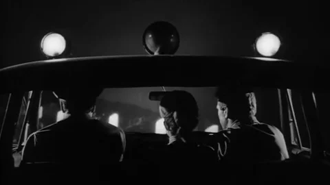 1965 - In this classic horror film, teenagers drive with police to chase down a Stock Footage
