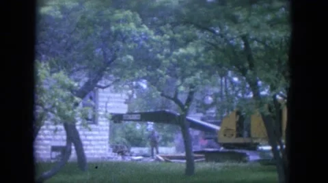 1965: construction area beside mud WAUPACA, WISCONSIN Stock Footage