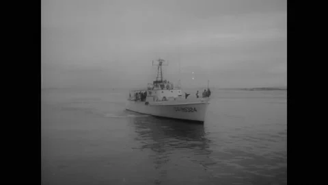 1965 - Cuban refugees arrive in Florida by boat, many of the Coast Guard, when Stock Footage 234532405