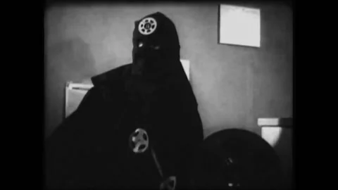 1966 - In this action comedy, a superhero violently interrupts the robbery of a Stock Footage 155800160