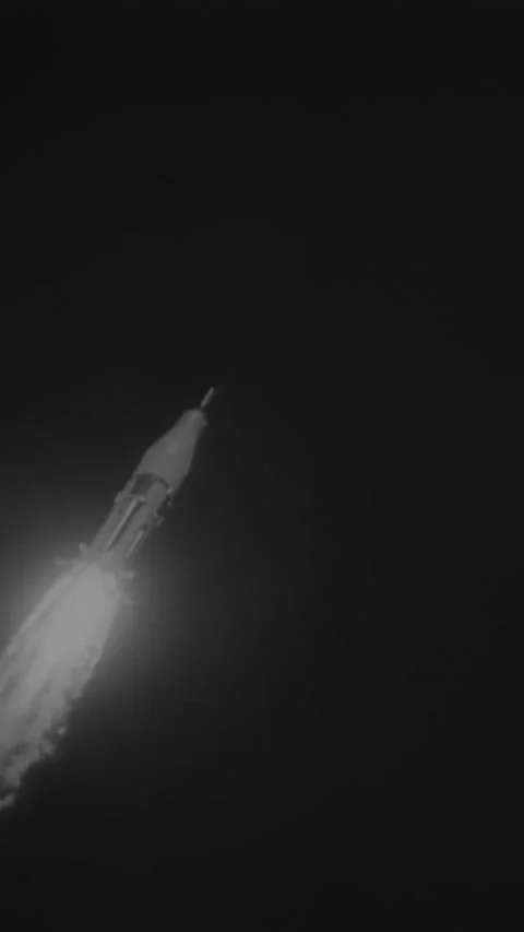 1966 - The Apollo Saturn 1B rocket is seen ascending through the night sky, and Stock Footage 284136543