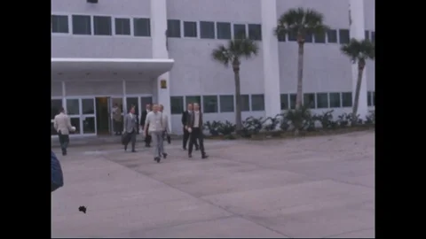 1966 - Astronauts are driven to a trailer at the Kennedy Space Center. Vídeos de archivo 112540114