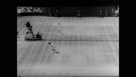 1966 - Billie Jean King defeats Maria Bueno at Wimbledon, and receives her Stock Footage 166833559