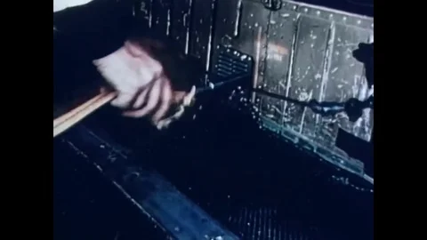1966 - Crate paper is dropped out of a plane before a parachutist. Stock Footage 83083527