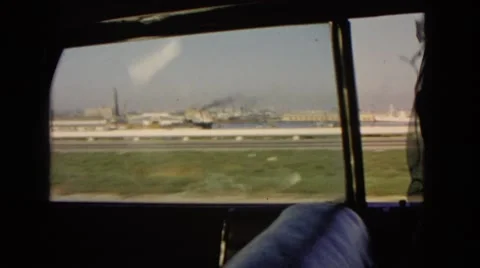 1966: driving down interstate highway looking through car out side window  Stock Footage 67969069