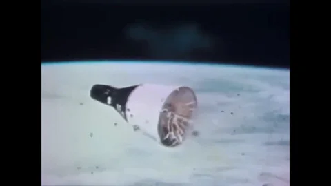 1966 - Footage shot from aboard Gemini XII shows its re-entry into Earth's Stock Footage