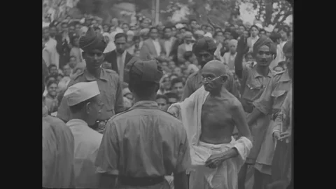 1966 - Mahatma Gandhi speaking, rioting, fires, refugees and Prime Minister Stock Footage